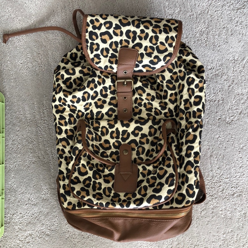 Leopard and leather backpack